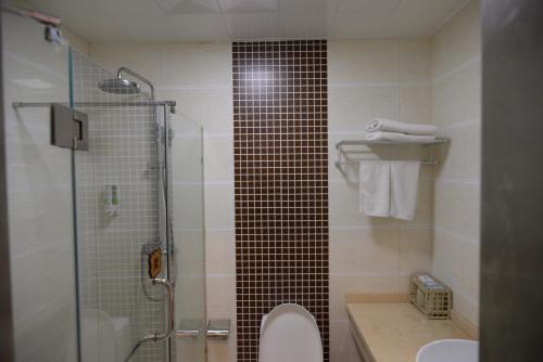 Imagen general del Hotel Weihai Xinbosi Holiday. Foto 1