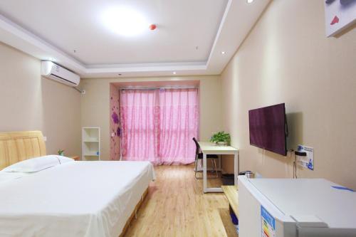 Imagen general del Hotel Weihai You Gang Vacation Aparthotel. Foto 2