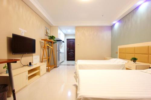Imagen general del Hotel Weihai You Gang Vacation Aparthotel. Foto 7