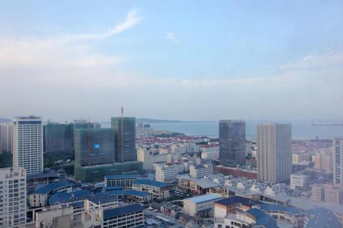 Imagen de la habitación del Hotel Weihai You Gang Vacation Aparthotel. Foto 9