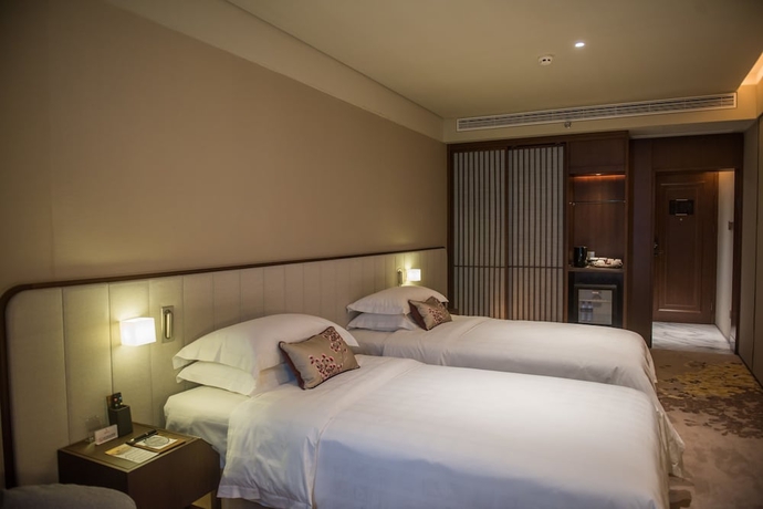 Imagen de la habitación del Hotel Weihaiwei Hotel. Foto 10