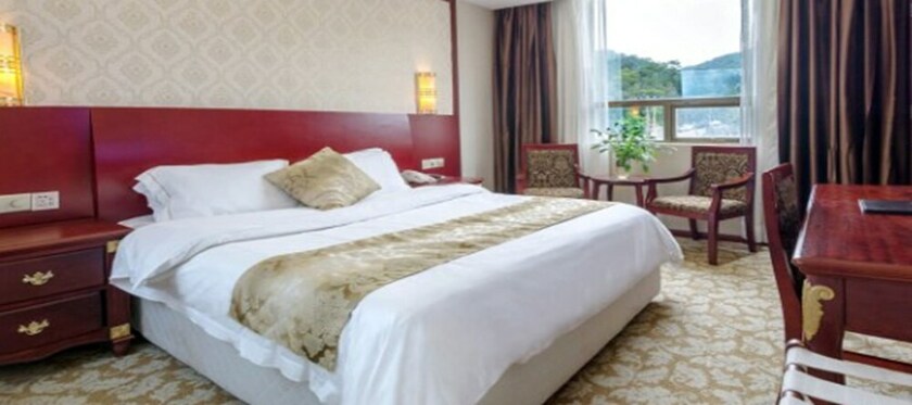 Imagen de la habitación del Hotel Weiluola Hotel Xiamen. Foto 12
