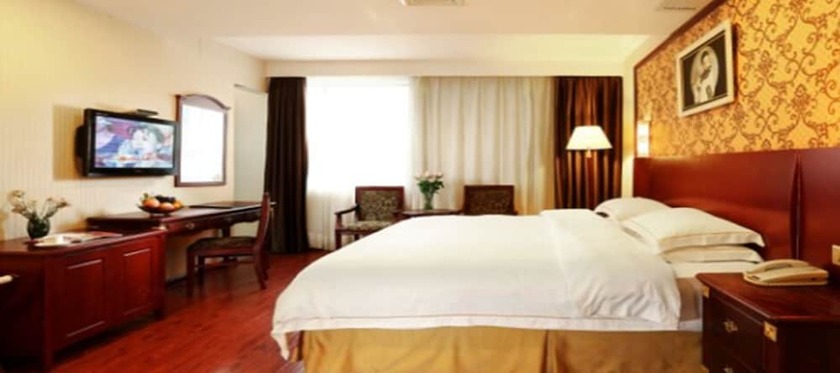 Imagen de la habitación del Hotel Weiluola Hotel Xiamen. Foto 14
