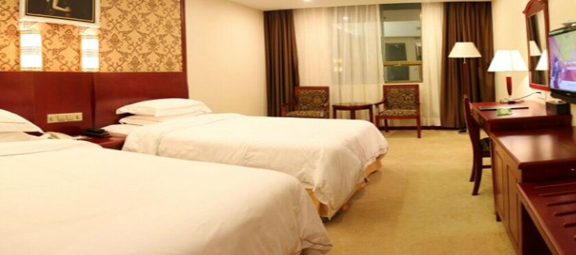 Imagen de la habitación del Hotel Weiluola Hotel Xiamen. Foto 17