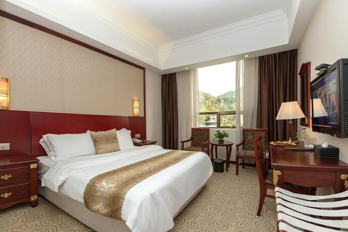 Imagen de la habitación del Hotel Weiluola Hotel Xiamen. Foto 20