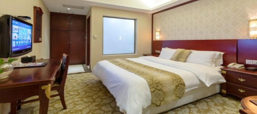 Imagen de la habitación del Hotel Weiluola Hotel Xiamen. Foto 24
