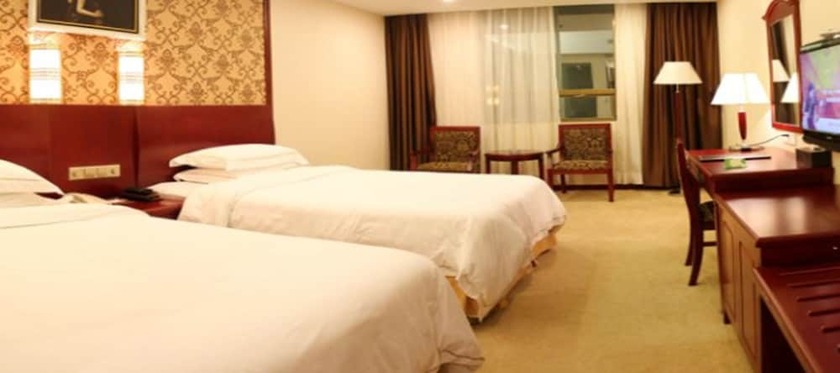 Imagen de la habitación del Hotel Weiluola Hotel Xiamen. Foto 26