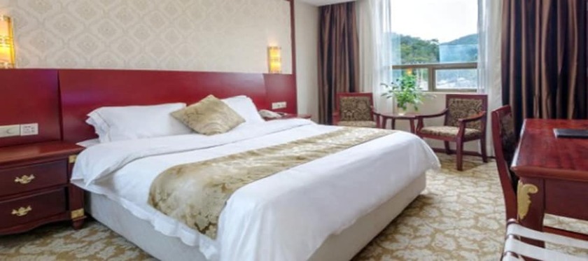 Imagen de la habitación del Hotel Weiluola Hotel Xiamen. Foto 29