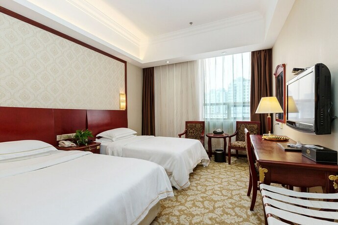 Imagen de la habitación del Hotel Weiluola Hotel Xiamen. Foto 31
