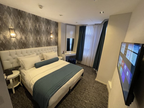 Imagen de la habitación del Hotel Weingart Port Hotel. Foto 14