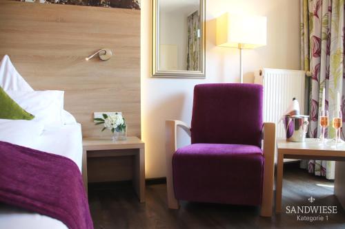 Imagen de la habitación del Hotel Weingut Sandwiese Winzerhotel. Foto 4