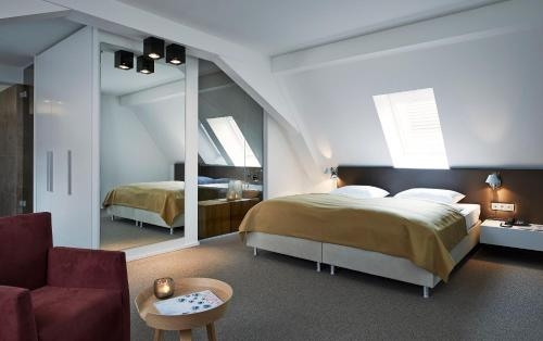 Imagen de la habitación del Hotel Weinhaus Henninger. Foto 9