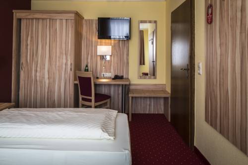 Imagen de la habitación del Hotel Weinhaus Kreuter. Foto 2