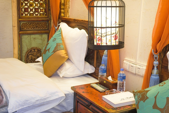Imagen de la habitación del Hotel Weishan Ancient Town Boutique Inn. Foto 5