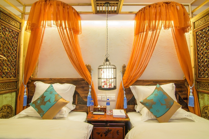 Imagen de la habitación del Hotel Weishan Ancient Town Boutique Inn. Foto 6
