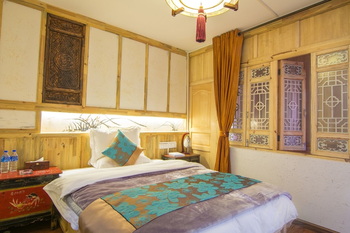 Imagen de la habitación del Hotel Weishan Ancient Town Boutique Inn. Foto 8