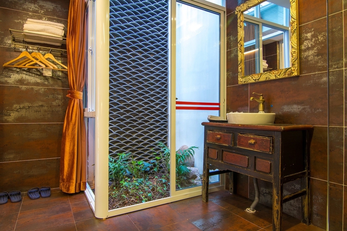 Imagen de la habitación del Hotel Weishan Ancient Town Boutique Inn. Foto 9