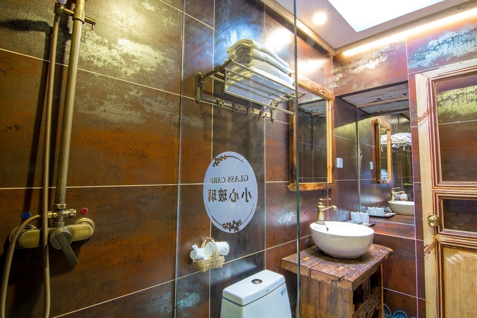 Imagen de la habitación del Hotel Weishan Ancient Town Boutique Inn. Foto 10
