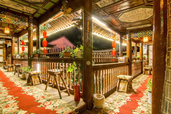 Imagen del bar/restaurante del Hotel Weishan Ancient Town Boutique Inn. Foto 3