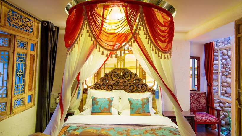 Imagen de la habitación del Hotel Weishan Ancient Town Boutique Inn. Foto 11