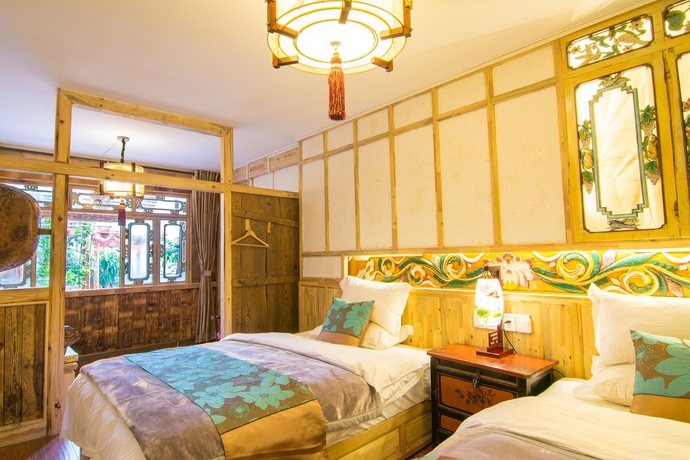 Imagen de la habitación del Hotel Weishan Ancient Town Boutique Inn. Foto 12