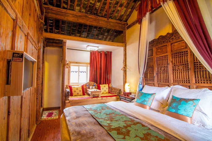 Imagen de la habitación del Hotel Weishan Ancient Town Boutique Inn. Foto 14