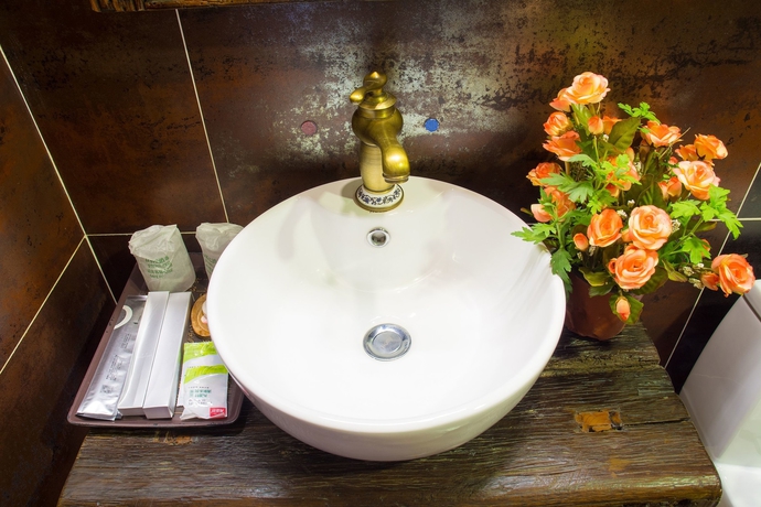 Imagen de la habitación del Hotel Weishan Ancient Town Boutique Inn. Foto 15