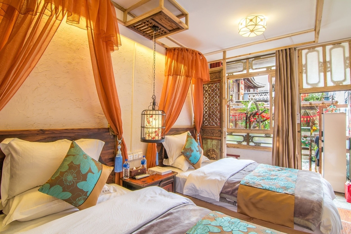Imagen de la habitación del Hotel Weishan Ancient Town Boutique Inn. Foto 16