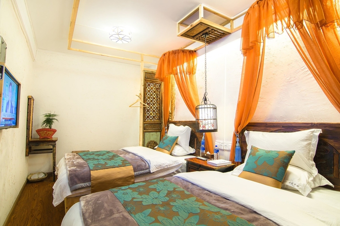 Imagen de la habitación del Hotel Weishan Ancient Town Boutique Inn. Foto 18