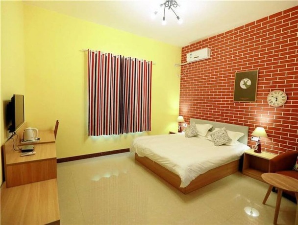 Imagen de la habitación del Hotel Weizhou Island Shengxiaguangnian Inn. Foto 12