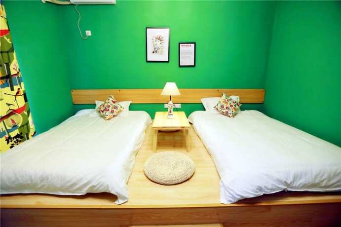 Imagen de la habitación del Hotel Weizhou Island Shengxiaguangnian Inn. Foto 15