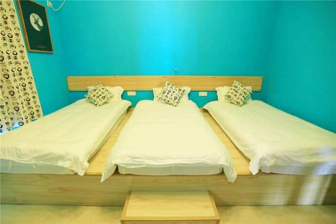 Imagen de la habitación del Hotel Weizhou Island Shengxiaguangnian Inn. Foto 16