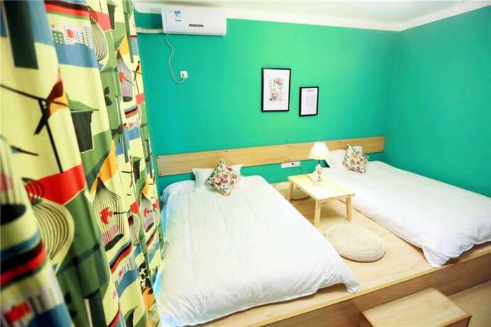 Imagen de la habitación del Hotel Weizhou Island Shengxiaguangnian Inn. Foto 17