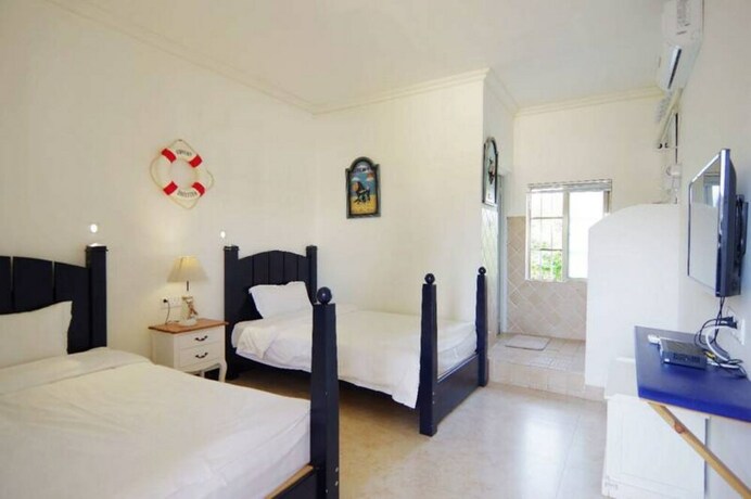 Imagen de la habitación del Hotel Weizhou Island Shengxiaguangnian Inn. Foto 20