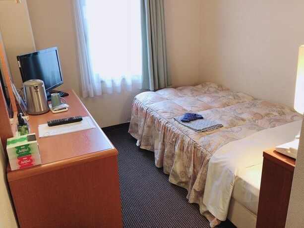 Imagen de la habitación del Hotel Welco Inn Yodoyabashi. Foto 3
