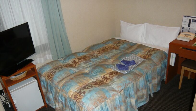 Imagen de la habitación del Hotel Welco Inn Yodoyabashi. Foto 4
