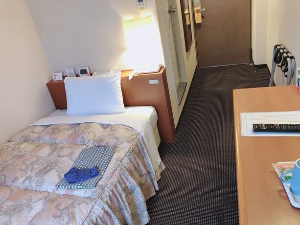 Imagen de la habitación del Hotel Welco Inn Yodoyabashi. Foto 11