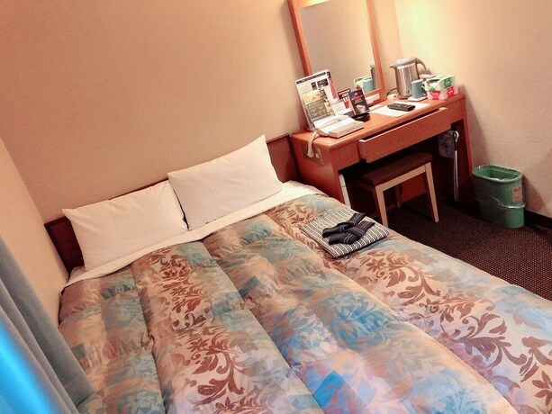 Imagen de la habitación del Hotel Welco Inn Yodoyabashi. Foto 12