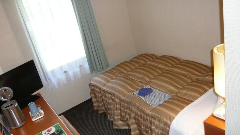 Imagen de la habitación del Hotel Welco Inn Yodoyabashi. Foto 13