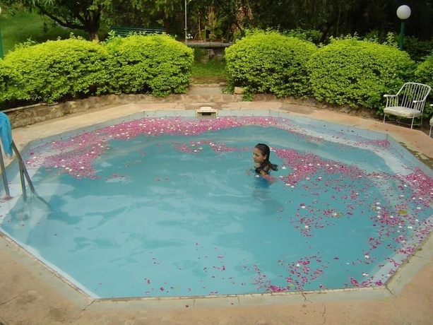 Imagen de la piscina del Hotel WelcomHeritage Judge\'s Court. Foto 19