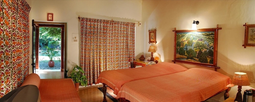 Imagen de la habitación del Hotel WelcomHeritage Maharani Bagh Orchard Retreat. Foto 8