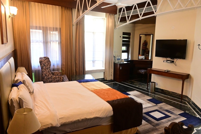 Imagen de la habitación del Hotel WelcomHeritage Taragarh Palace. Foto 12