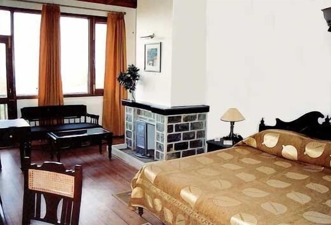 Imagen de la habitación del Hotel WelcomHeritage Windsor Lodge. Foto 8