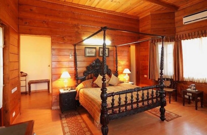 Imagen de la habitación del Hotel WelcomHeritage Windsor Lodge. Foto 9
