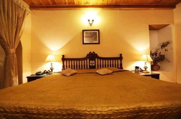Imagen de la habitación del Hotel WelcomHeritage Windsor Lodge. Foto 10