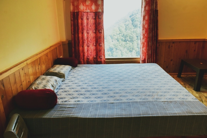 Imagen de la habitación del Hotel Welcome Chail Homestay. Foto 8