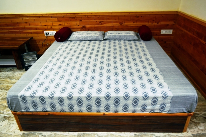 Imagen de la habitación del Hotel Welcome Chail Homestay. Foto 9