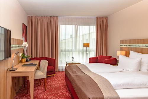 Imagen de la habitación del Hotel Welcome Darmstadt City Center. Foto 8