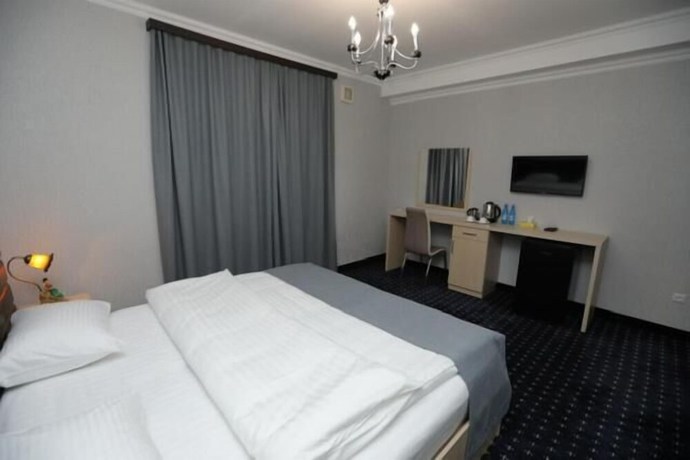 Imagen de la habitación del Hotel Welcome Inn, Erev&aacute;n. Foto 14