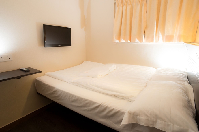 Imagen de la habitación del Hotel Welcome Inn, Tsim Sha Tsui. Foto 2